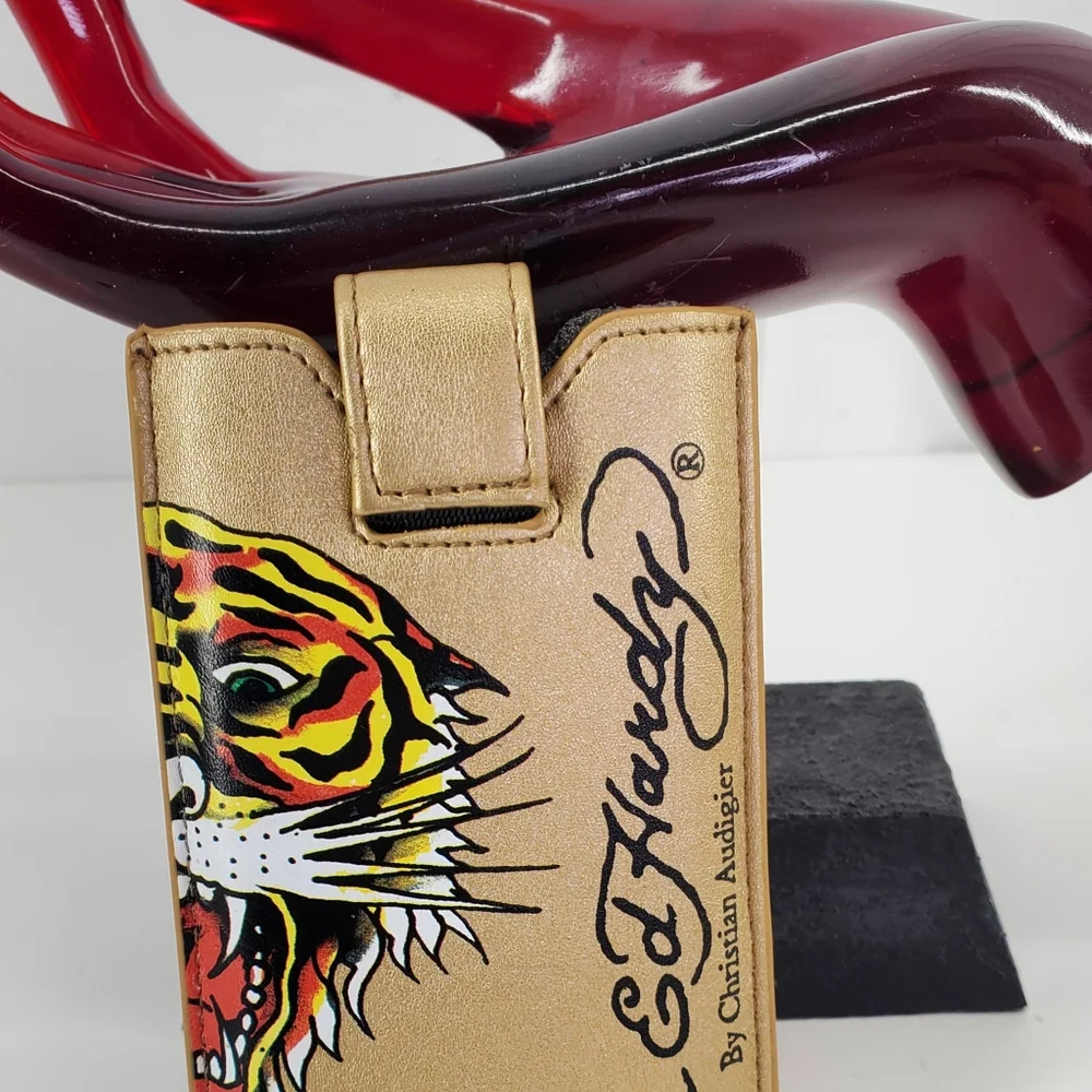 ED HARDY GOLD UNIVERSAL CELL PHONE CASE WITH LEATHER PULL & SNAP CLOSURE. $48.00